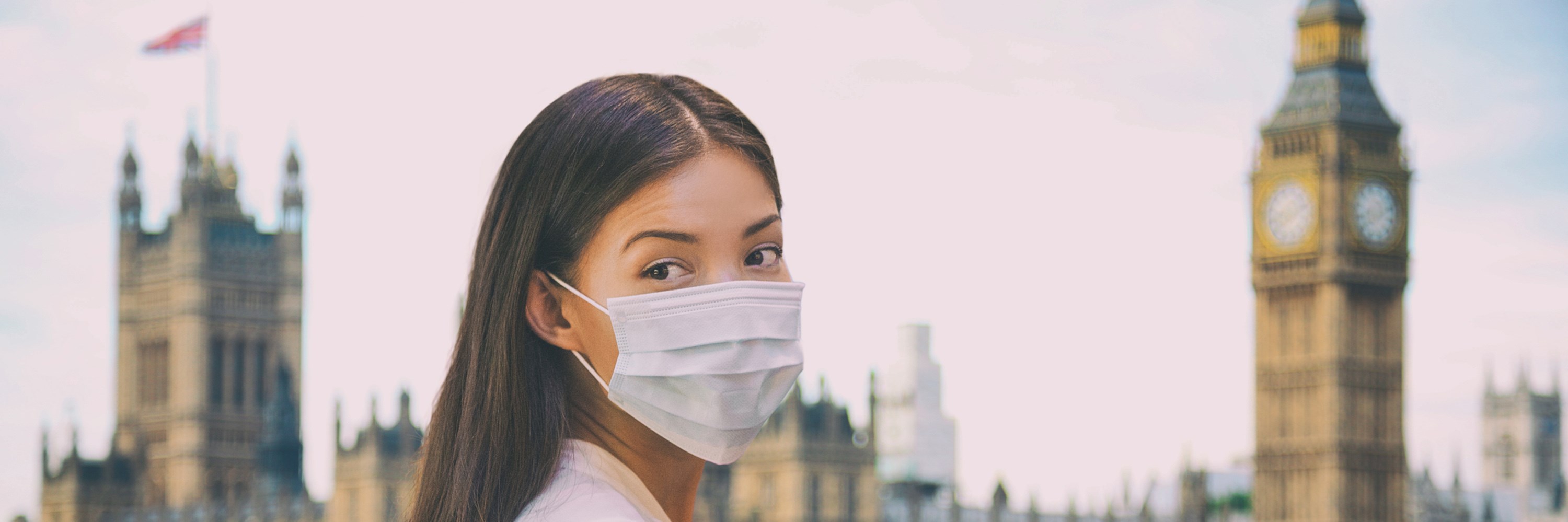 Westminister and woman with face mask. Photo: Martinmark/Dreamstime