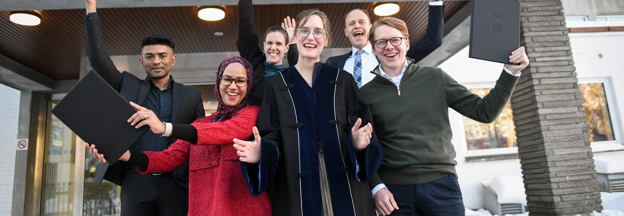 SOME OF THE 2024 PhDs: Jareef Bin Martuza, Iffat Tarannum, Ingvild Skarpeid, Lars Arvei Moen and Eirik Berger Abel together with  Vice Rector research, Professor Malin Arve. Photo: Ingunn Gjærde